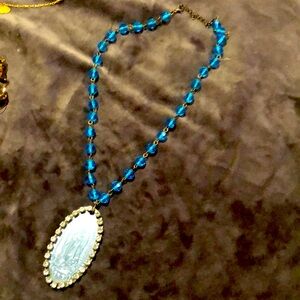 Our Lady of Guadalupe aqua/turquoise crystal necklace.